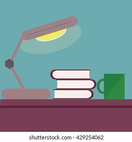 Stack of book in real environment with lamp.