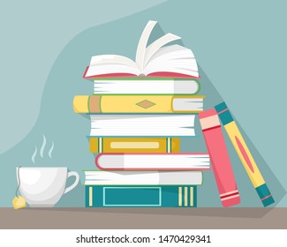 Stack of books with a cup of hot tea. Knowledge, learning and education concept design.