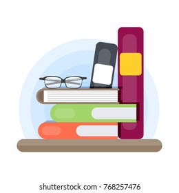 Stack of books with eyeglasses on white background.