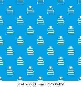 Stack of books and white cup pattern repeat seamless in blue color for any design. Vector geometric illustration