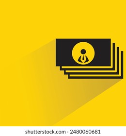 stack of business cards with drop shadow on yellow background