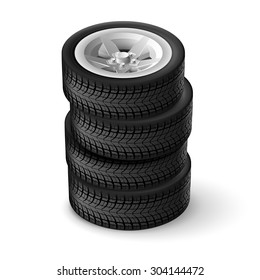 Stack of car or truck tires isolated on a white background