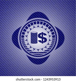 stack of coins icon inside badge with denim texture