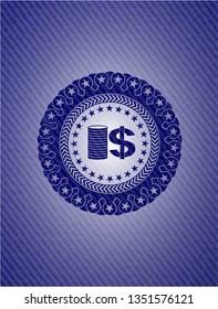 stack of coins icon inside badge with denim background