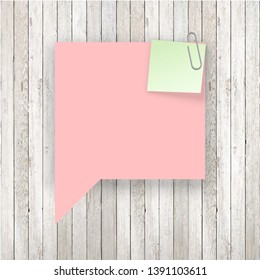 Stack of colored stickers attached metal paper clip with curled corner, ready for your message. Set of color stickers isolated on white wooden boards wall background. illustration set paper Front view