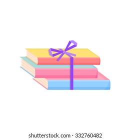 Stack of colorful books tied up with ribbon