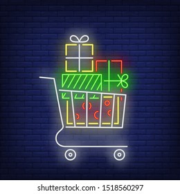 Stack of gifts in cart neon sign. Present boxes, carton wrap, ribbon, bow. Vector illustration in neon style for topics like purchases, holiday, Christmas shopping