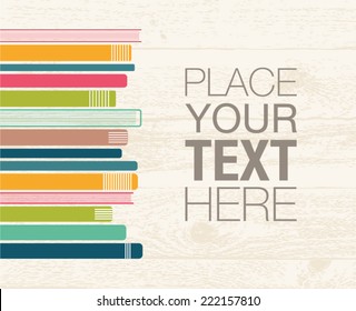 Stack of multicolored books on wooden background design template