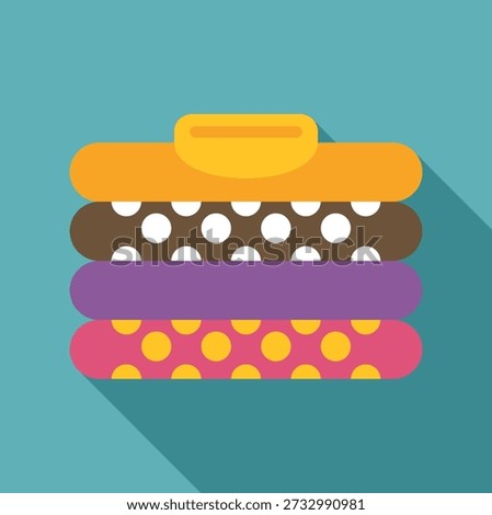 Stack of neatly folded laundry with colorful patterns and a minimalist design