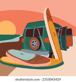 A stack of paddle boards sitting by a retro van on the beach at sunset