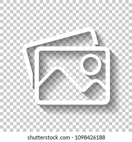Stack of pictures with couple of mountains and sun. Simple linear icon. White icon with shadow on transparent background