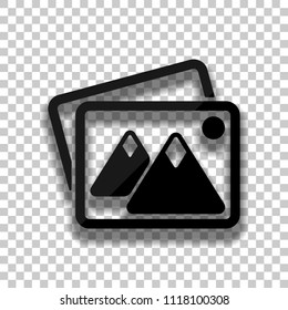 Stack of pictures with couple of mountains and sun. Simple icon. Black glass icon with soft shadow on transparent background