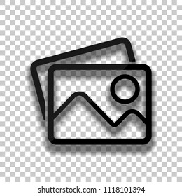Stack of pictures with couple of mountains and sun. Simple linear icon. Black glass icon with soft shadow on transparent background