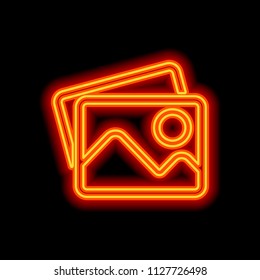Stack of pictures with couple of mountains and sun. Simple linear icon. Orange neon style on black background. Light icon