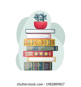 A stack of retro-style books with a flower pot on top.