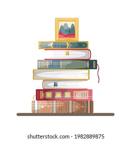 Una pila de libros de estilo retro con un marco de imagen encima.