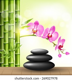 Stack of spa stones with orchid pink flowers and bamboo and sunlight on light-green background