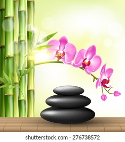 Stack of spa stones with orchid pink flowers and bamboo and sunlight on light-green background