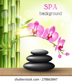 Stack of spa stones with orchid pink flowers and bamboo and sunlight on light-green background