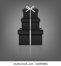 Stack of three realistic black gift boxes with white ribbon and bow on gray background with reflection. Vector EPS10 illustration. 