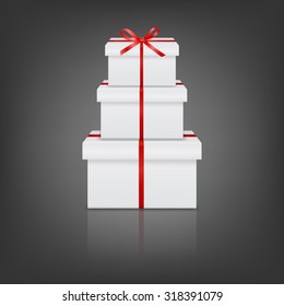 Stack of three realistic white gift boxes with red ribbon and bow on gray background with reflection. Vector EPS10 illustration. 