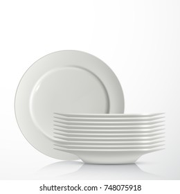 Stack of white ceramic plates, isolated on white