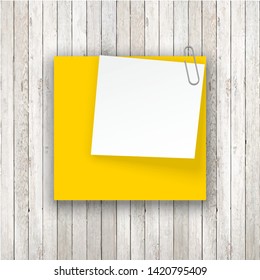 Stack of Yellow stickers attached metal paper clip with corner, ready for your message. Set of Yellow color stickers isolated on white wall background. illustration set paper Front white wall view