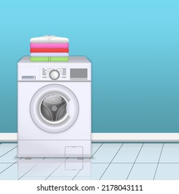 ropa apilada plegable en lavadora