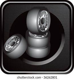 stacked racing tires on black web icon