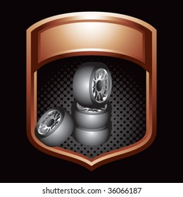 stacked tires on bronze display