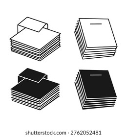 stacks of white and black paper sheets with envelopes on top