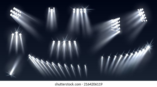 Stadium spotlights. Football field directional light sources, realistic searchlights. Illuminated studio and arena stage lamps, different directions projector, vector isolated set - Shutterstock ID 2164206119