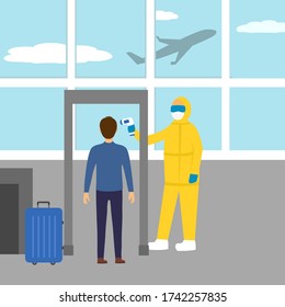 Staff measuring the temperature of passenger with medical digital infrared thermometer at the airport. Covid-19 coronavirus screening to prevent pandemic outbreak. Covid-19 thermo scan checkpoint.