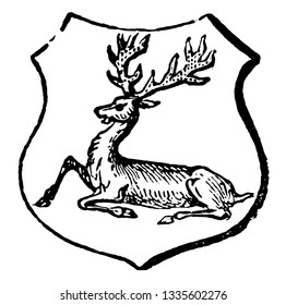 Stag Attired have a horns of a stag are of a different tincture to its head, vintage line drawing or engraving illustration.