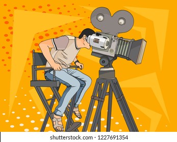 Stage director on set pop art retro vector illustration. Comic book style imitation. videographer and camera on the legs