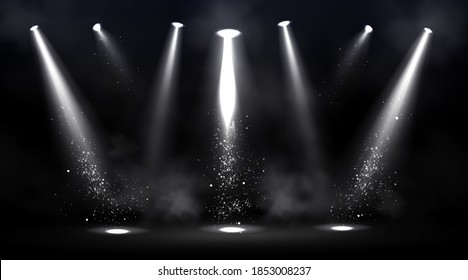 Stage illuminated by spotlights. Empty scene with spot of light on floor. Vector realistic illustration of studio, theater or club interior with beams of lamps, smoke and glowing particles