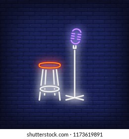 Stage Neon Icon. Mic And Chair On Brick Wall Background. Show Concept. Vector Illustration Can Be Used For Neon Signs, Advertising, Stand Up Show, Music Contest