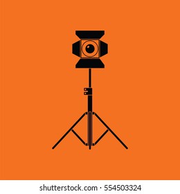 Stage projector icon. Orange background with black. Vector illustration.