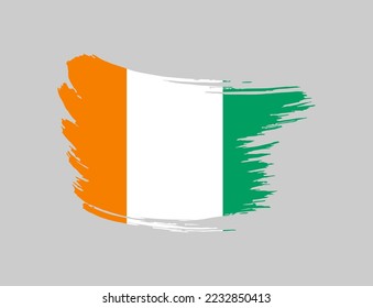 Stain brush painted stroke flag of Cote dIvoire on isolated background