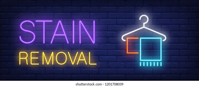 Stain removal neon sign. Hanger with towels. Laundry, cleaning service, dry cleaning. Night bright advertisement. Vector illustration in neon style for service, hygiene, housework