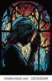 Stained glass window with human figure praying.