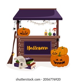 Stall counter for fall Halloween holiday with lanterns, pumpkins, books, and witch items. Festive decoration with horror elements