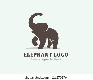 Stand elephant with roaring logo design inspiration