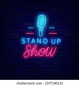 Stand up show neon emblem with microphone icon. Comedian performance. Light sign. Party label. Glowing effect banner. Shiny logotype. Vector stock illustration