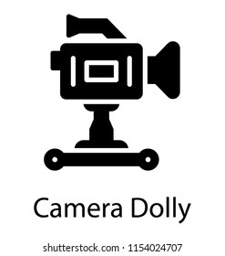 
Stand with wheels on which a video camera is placed showing video dolly concept 
