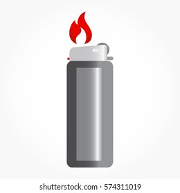 a standing dark silver metal gas lighter with flaming fire above