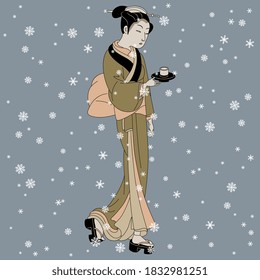 Standing Japanese girl in kimono holding cup of tea or coffee under snowflakes. Ethnic winter motif.