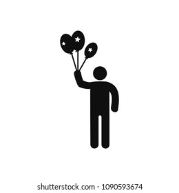 standing man with balloons