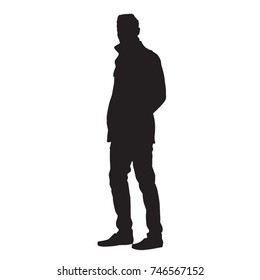 Standing man in coat, vector silhouette