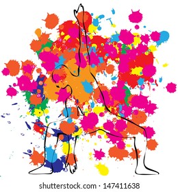 A standing man, feeling power, which is shown by splashes